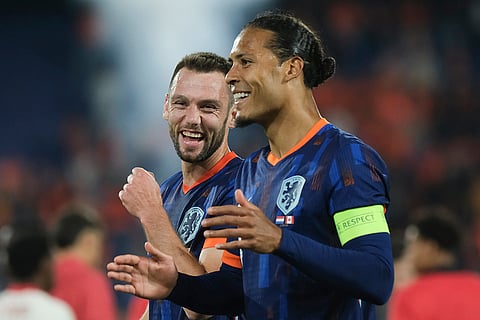 Netherlands players celebrate after match against Canada